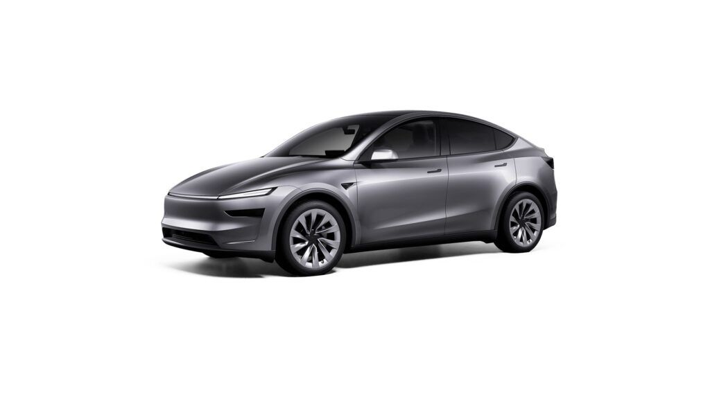 Tesla Model 3 eléctrico en color gris, coche compacto y moderno para movilidad sostenible.