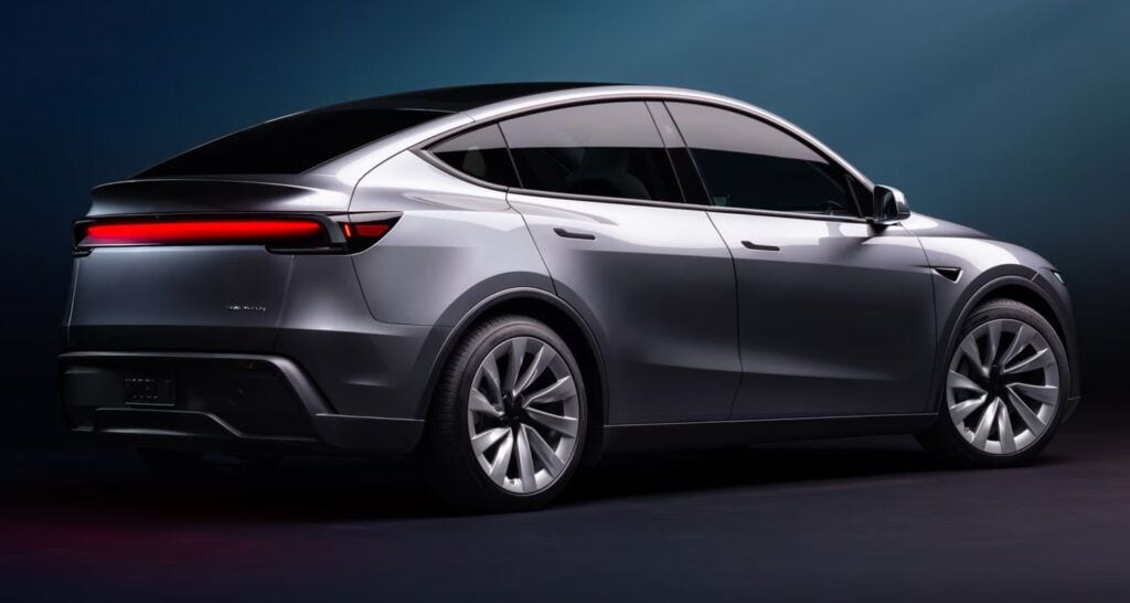 Coche eléctrico de lujo en color gris oscuro, perfil lateral, diseño aerodinámico y moderno.
